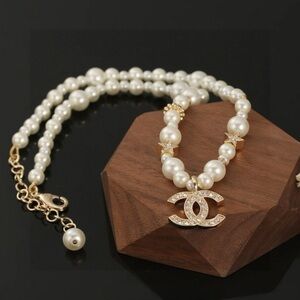 CHANEL Pearl and Gold-Tone Logo Necklace